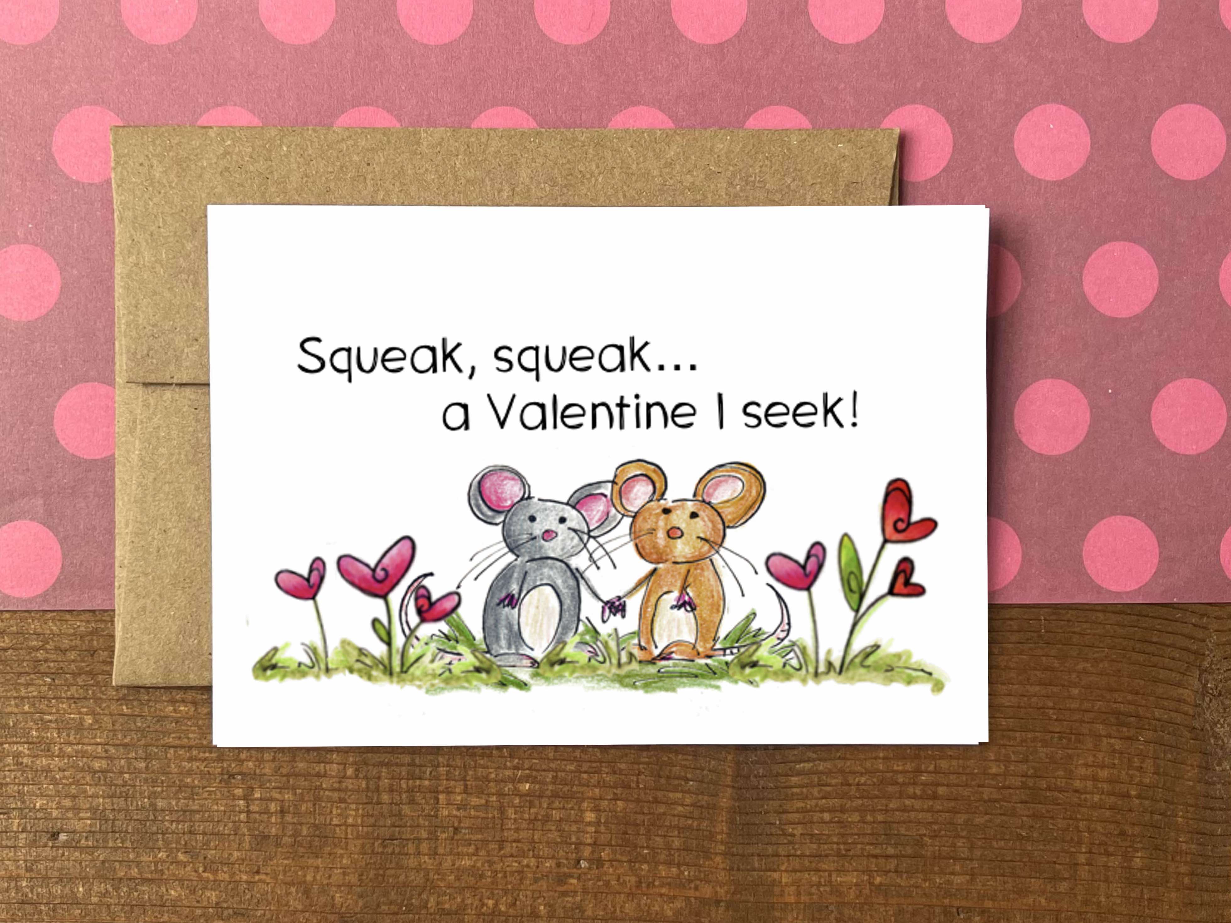 A Valentine's Day note card with an illustration of two mice holding hands and the message "Squeak, squeak...a Valentine I seek!"