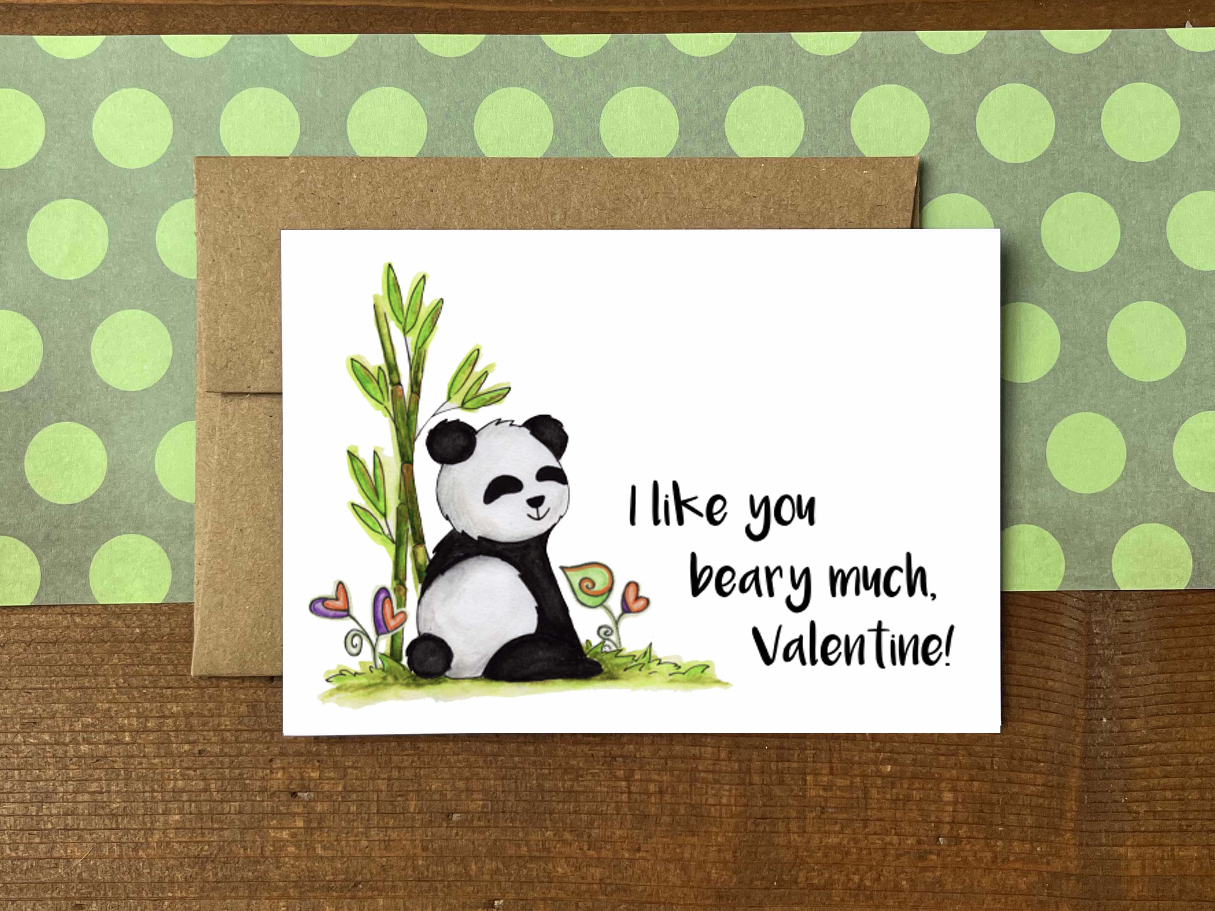 A Valentine's Day note card with an illustration of a panda and the message "I like you beary much, Valentine!"